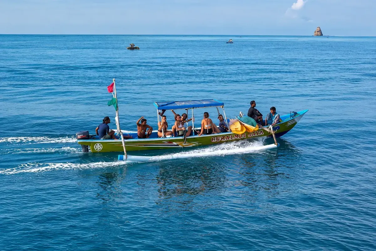 Outrigger Boat to the Peak